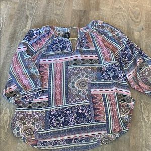 Blouse with arm cut outs